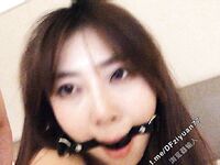 A stunningly beautiful international student from Nanjing, "Zheng Xinwen," was subjected to humiliating and dog-like discipline by her handsome boyfriend. She was forced to crawl on all fours, urinate on his face, and be choked. Her face was vis