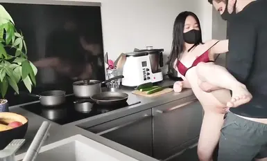 The contrasting girlfriend was preparing dinner in the kitchen when her foreign boyfriend came up and drove without a condom and ejaculated into her pink pussy and her little mouth had to be filled first